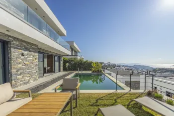 Sea vista private villas in Gumusluk complex for sale